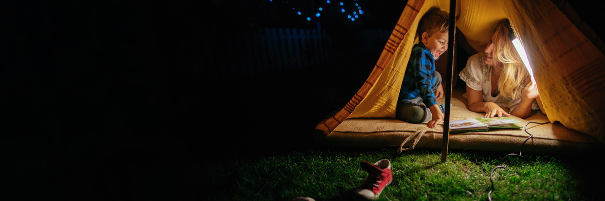 Au pair with child in an tent