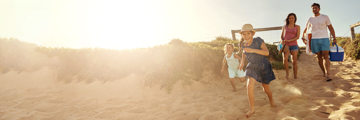 A family being excited about going to the beach