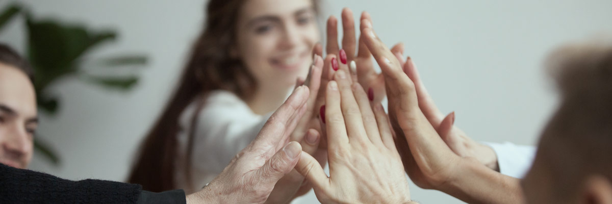 A couple of people doing an high five