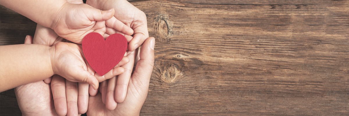 Hands holding a heart
