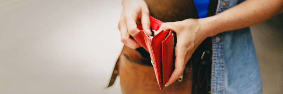 Young woman with wallet