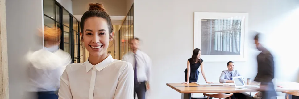 A successful young woman in an office