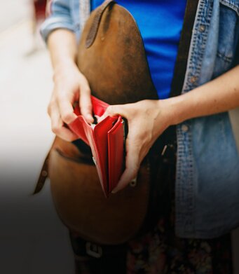 Young woman with wallet