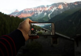 Mobile Phone in front of a Mountain View