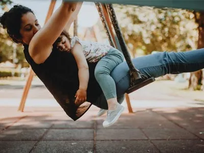 Woman and sleeping child