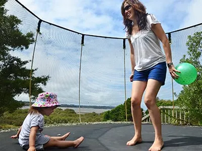 Woman an a Kid jumping