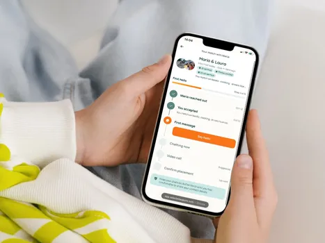 Phone mockup from AuPairWorld platform.