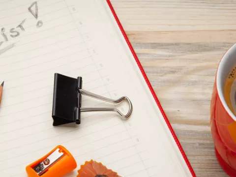 To do list and a coffee cup