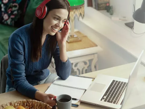 A person in front of a laptop