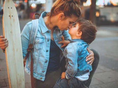 au pair with a hostkid and a skateboard