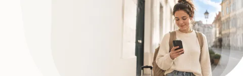 Woman walking around with a mobile phone