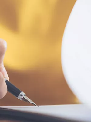 A person signing a contract