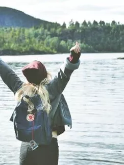 Girl in front of a lake