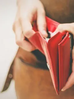 Girl with red purse in her hands