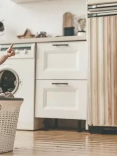 Au-pair doing housework with a kid