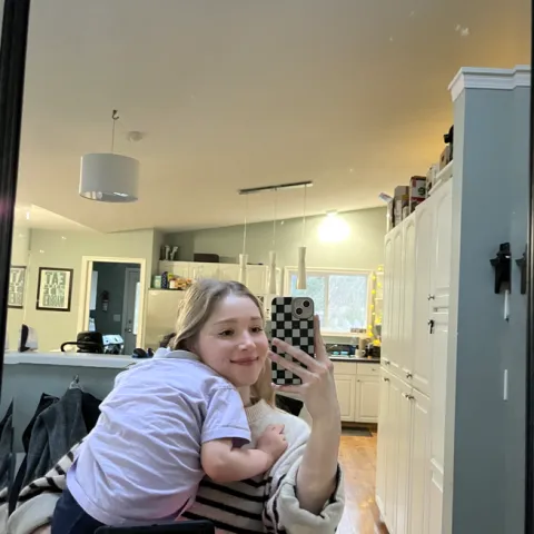 Jessica carrying her host kid